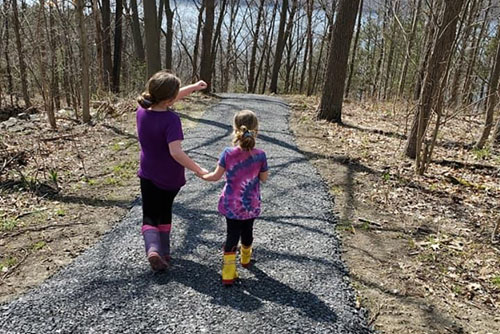 girls on nature path